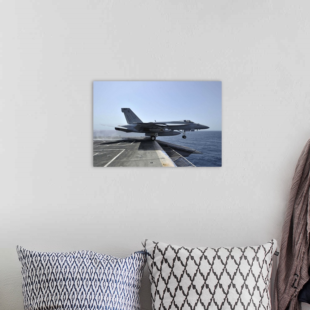 A bohemian room featuring Arabian Sea, March 28, 2011 - An F/A-18E Super Hornet launches from the aircraft carrier USS Ente...