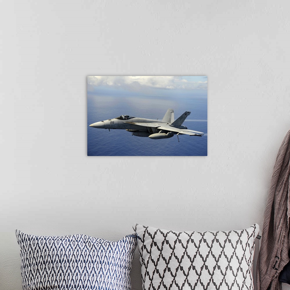 A bohemian room featuring April 24, 2013 - An F/A-18E Super Hornet participates in an air power demonstration over the Paci...