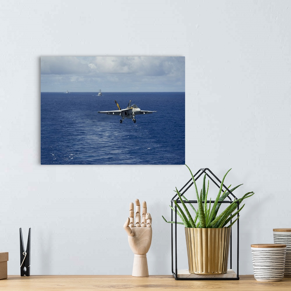 A bohemian room featuring Philippine Sea, August 20, 2013 - An F/A-18E Super Hornet prepares to make an arrested landing on...