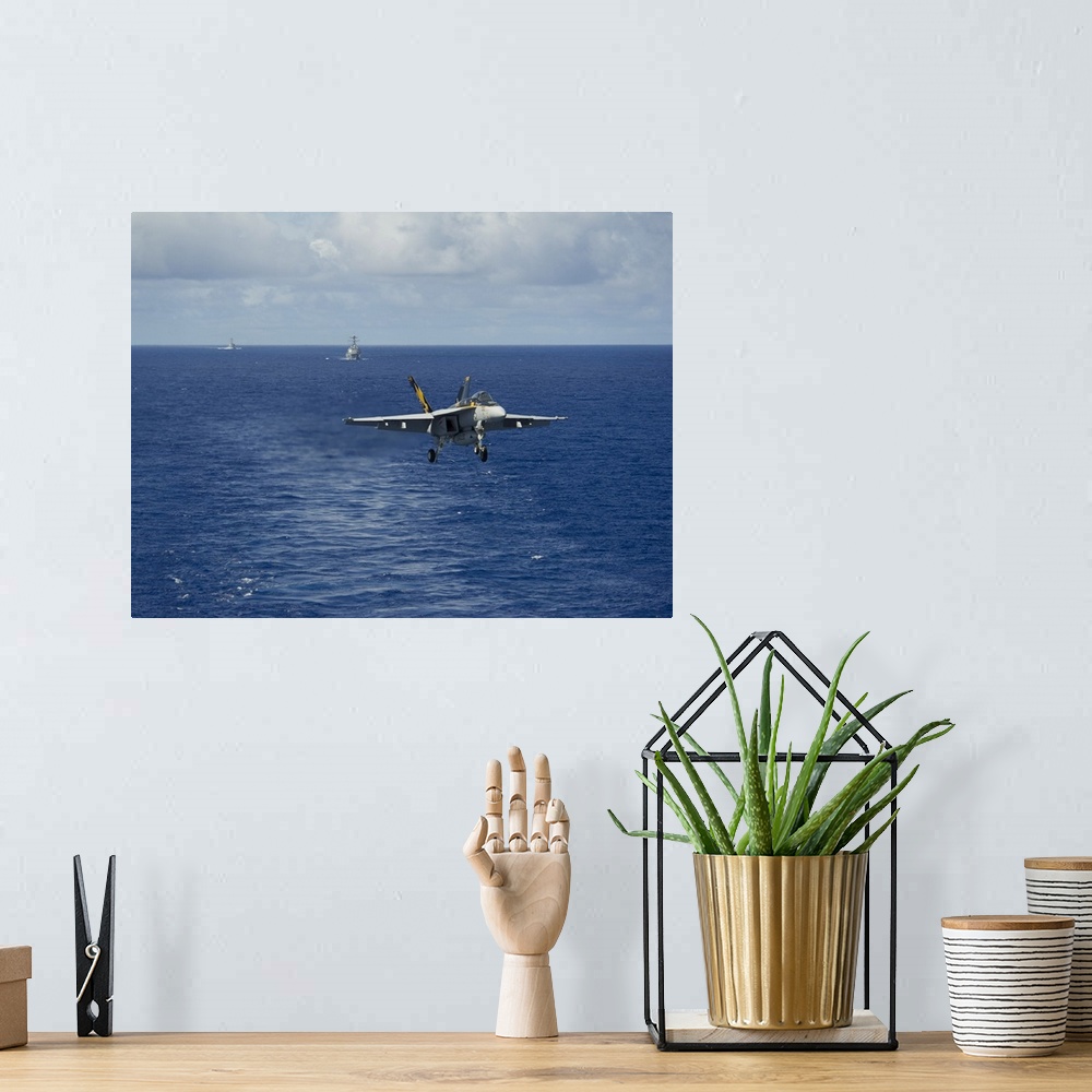 A bohemian room featuring Philippine Sea, August 20, 2013 - An F/A-18E Super Hornet prepares to make an arrested landing on...