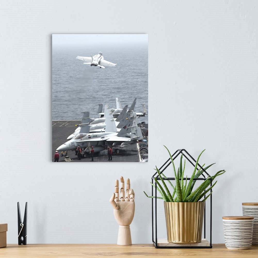 A bohemian room featuring Gulf of Oman, July 13, 2013 - An F/A-18F Super Hornet  launches from the flight deck of the aircr...