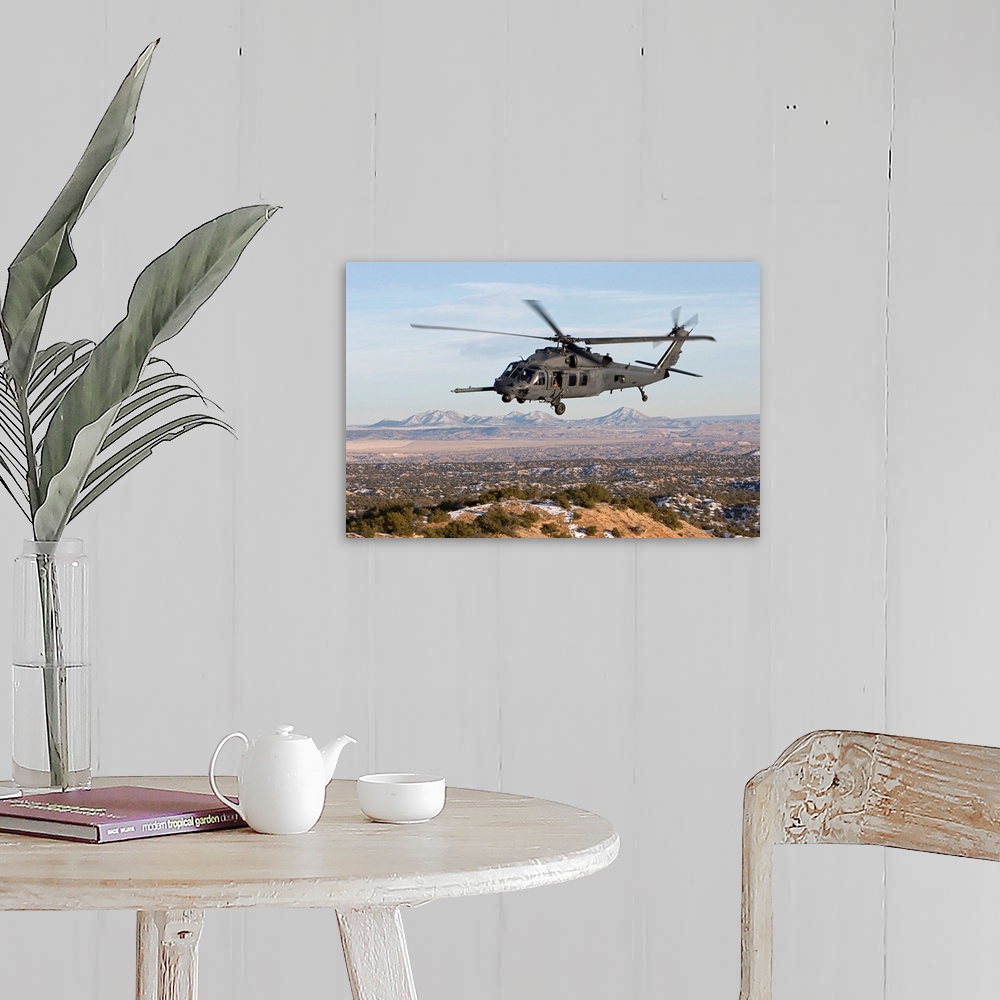 A farmhouse room featuring An HH-60G Pave Hawk from the 512th RQS flies a low level route during a training mission out of K...