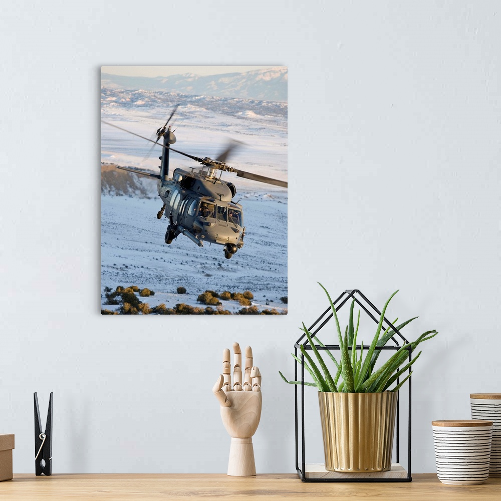 A bohemian room featuring An HH-60G Pave Hawk from the 512th RQS flies a low level route during a training mission out of K...