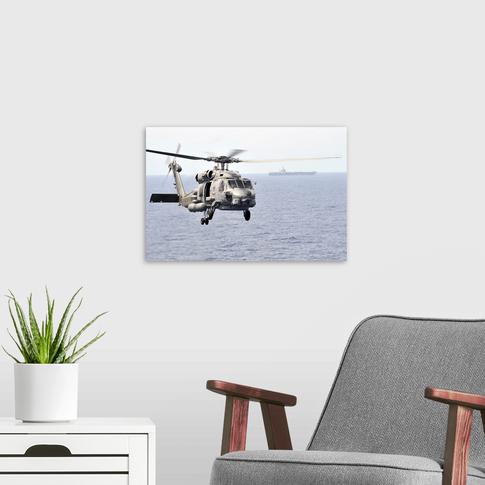 A modern room featuring Pacific Ocean, March 9, 2011 - An MH-60R Seahawk helicopter participates in an air power demonstr...