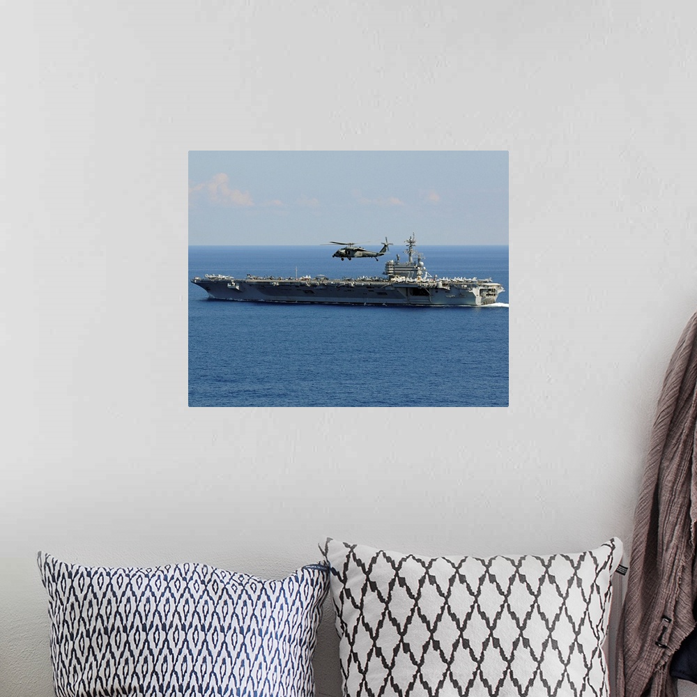 A bohemian room featuring Atlantic Ocean, October 10, 2010 - An MH-60S Seahawk helicopter flies over the aircraft carrier U...