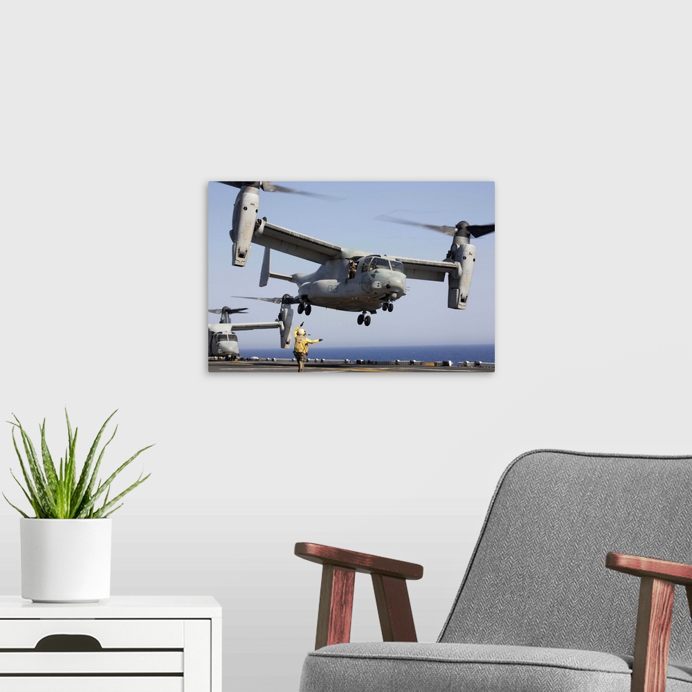 A modern room featuring Red Sea, June 30, 2013 - An MV-22 Osprey takes off from the amphibious assault ship USS Kearsarge.