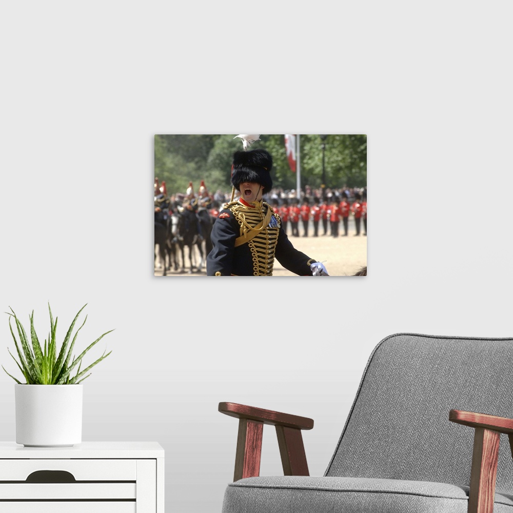 A modern room featuring An officer shouts commands during the Trooping the Colour ceremony at Horse Guards Parade, London...
