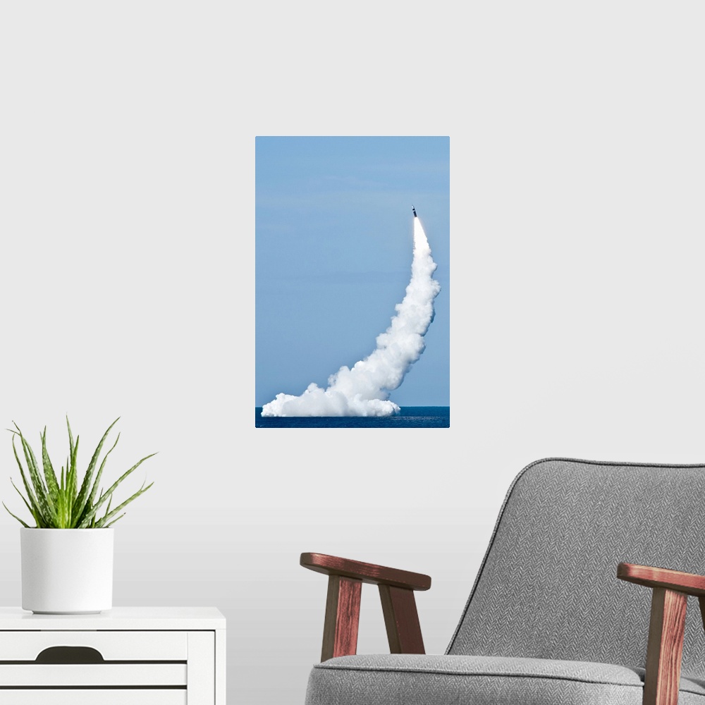 A modern room featuring Pacific Ocean, March 1, 2011 - An unarmed Trident II D5 missile launches from the Ohio-class flee...