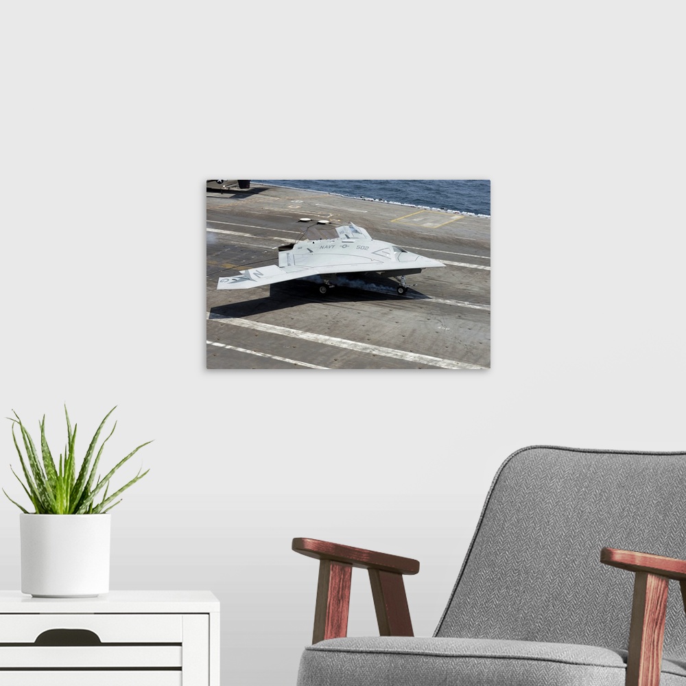 A modern room featuring Atlantic Ocean, July 10, 2013 - An X-47B Unmanned Combat Air System (UCAS) makes a carrier-based ...