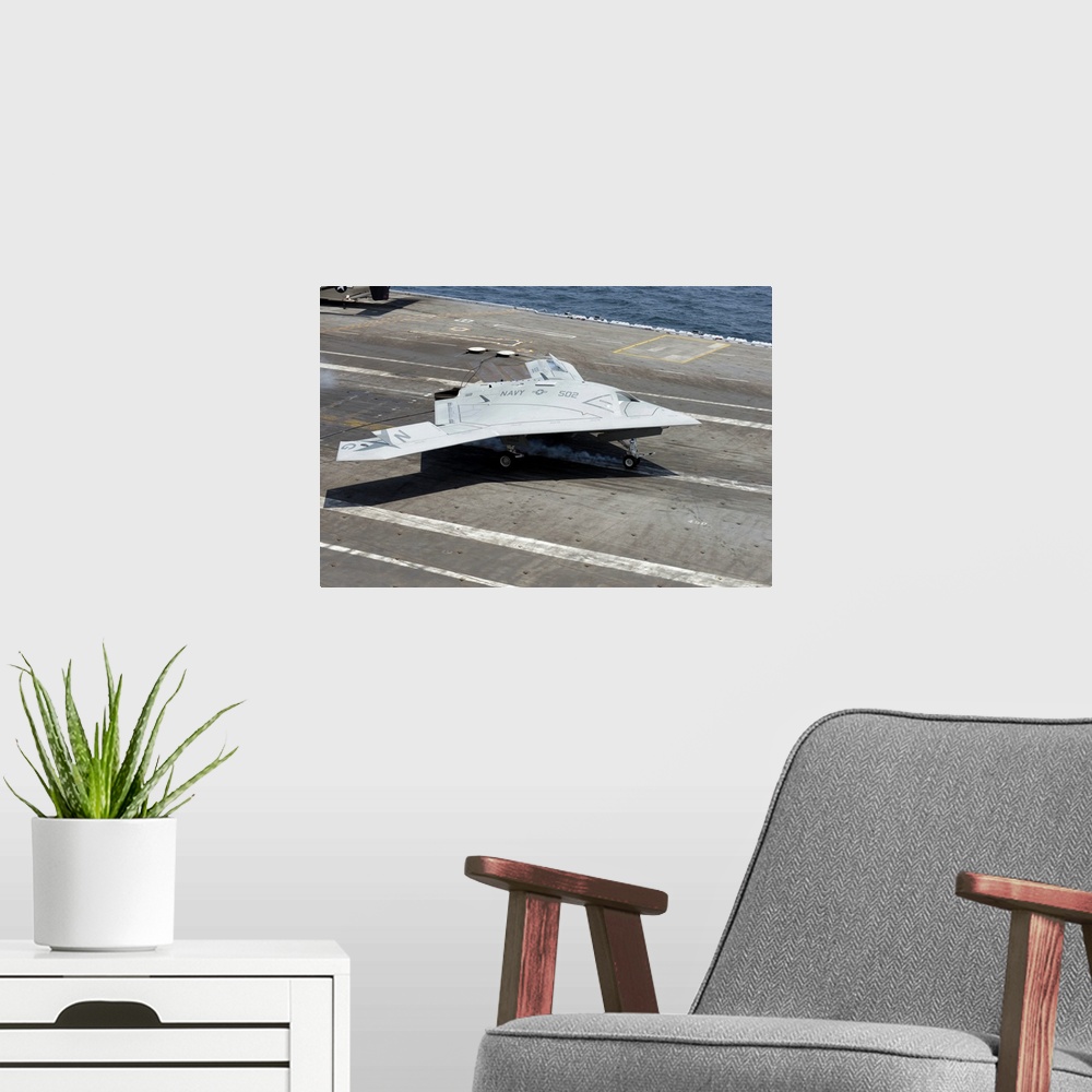 A modern room featuring Atlantic Ocean, July 10, 2013 - An X-47B Unmanned Combat Air System (UCAS) makes a carrier-based ...