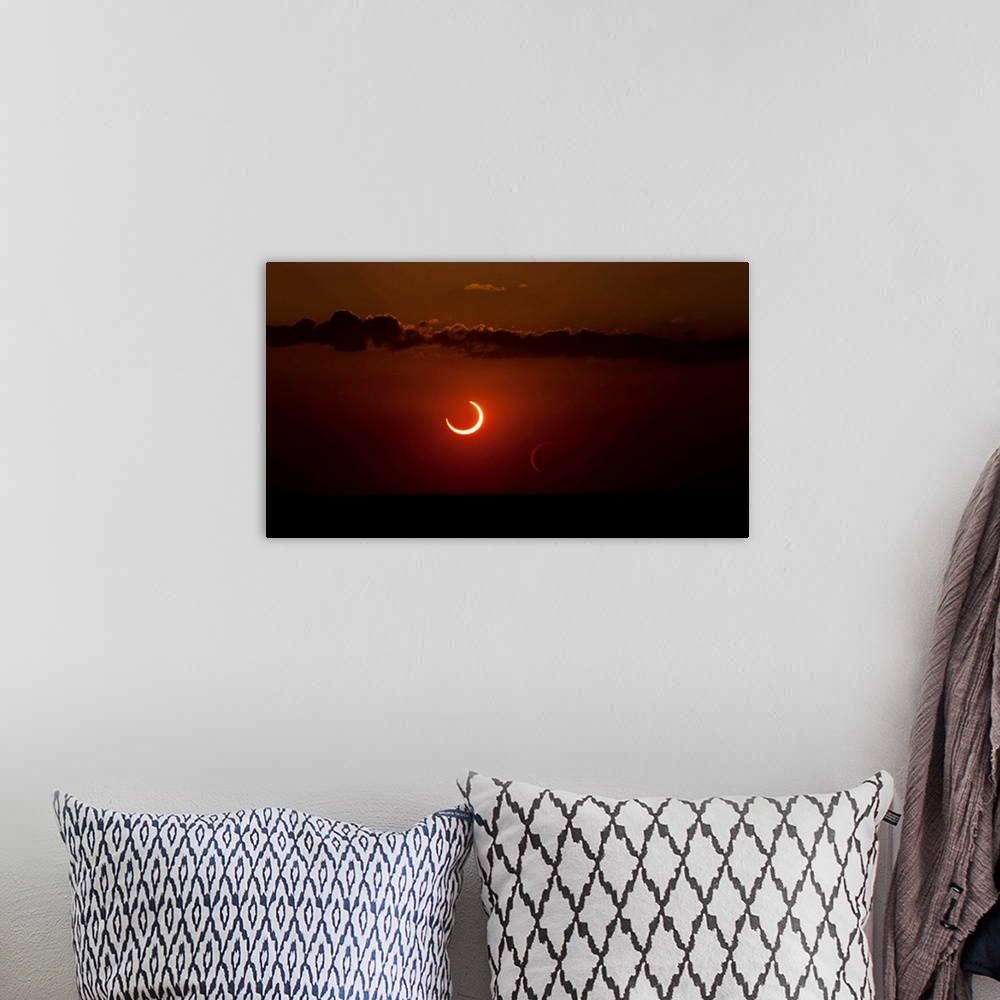 A bohemian room featuring Annular solar eclipse of 2012.