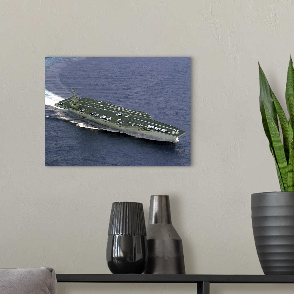 A modern room featuring Artist's concept of CVN21 one of a new class of aircraft carriers