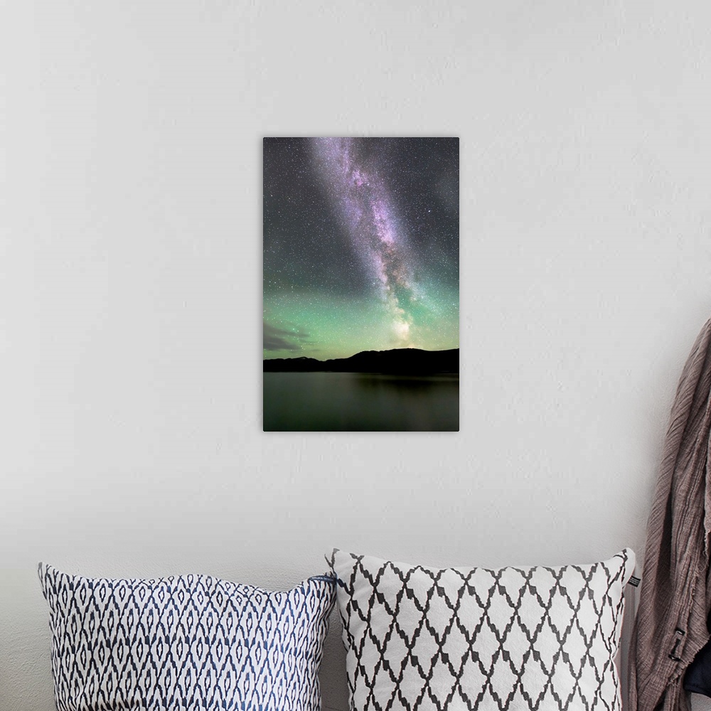 A bohemian room featuring Aurora borealis and Milky Way above Fish Lake, Whitehorse, Yukon, Canada.