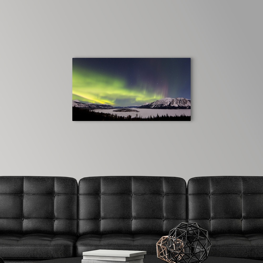 A modern room featuring Aurora borealis over Bove Island, Windy Arm, Carcross, Yukon, Canada.