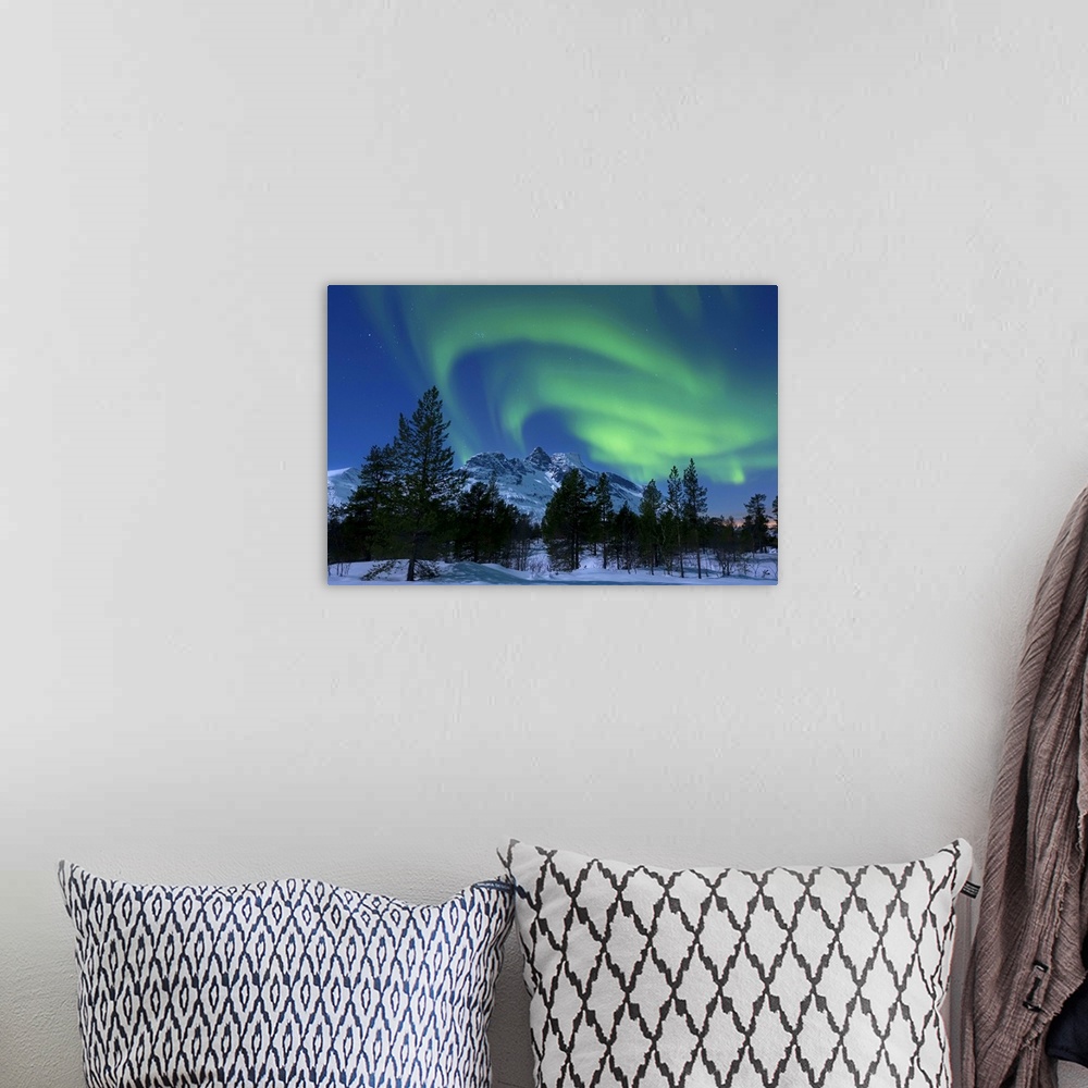 A bohemian room featuring Aurora Borealis over Nova Mountain Wilderness, Troms, Norway.