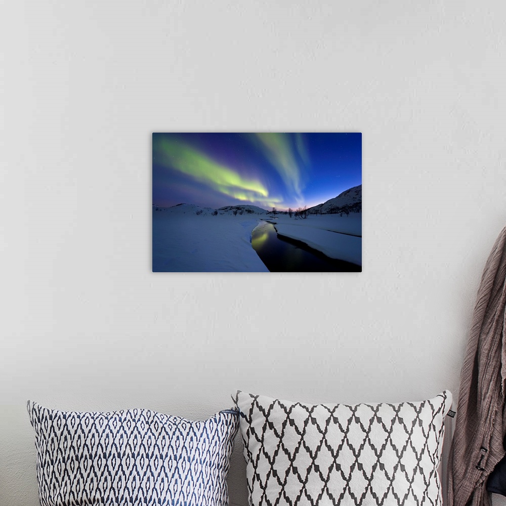 A bohemian room featuring Aurora Borealis over Skittendalen Valley and the Skittendalen River in Troms County, Norway. Auro...
