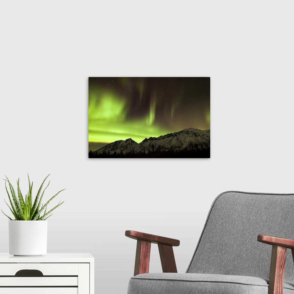 A modern room featuring Bright aurora borealis, Annie Lake, Yukon, Canada.