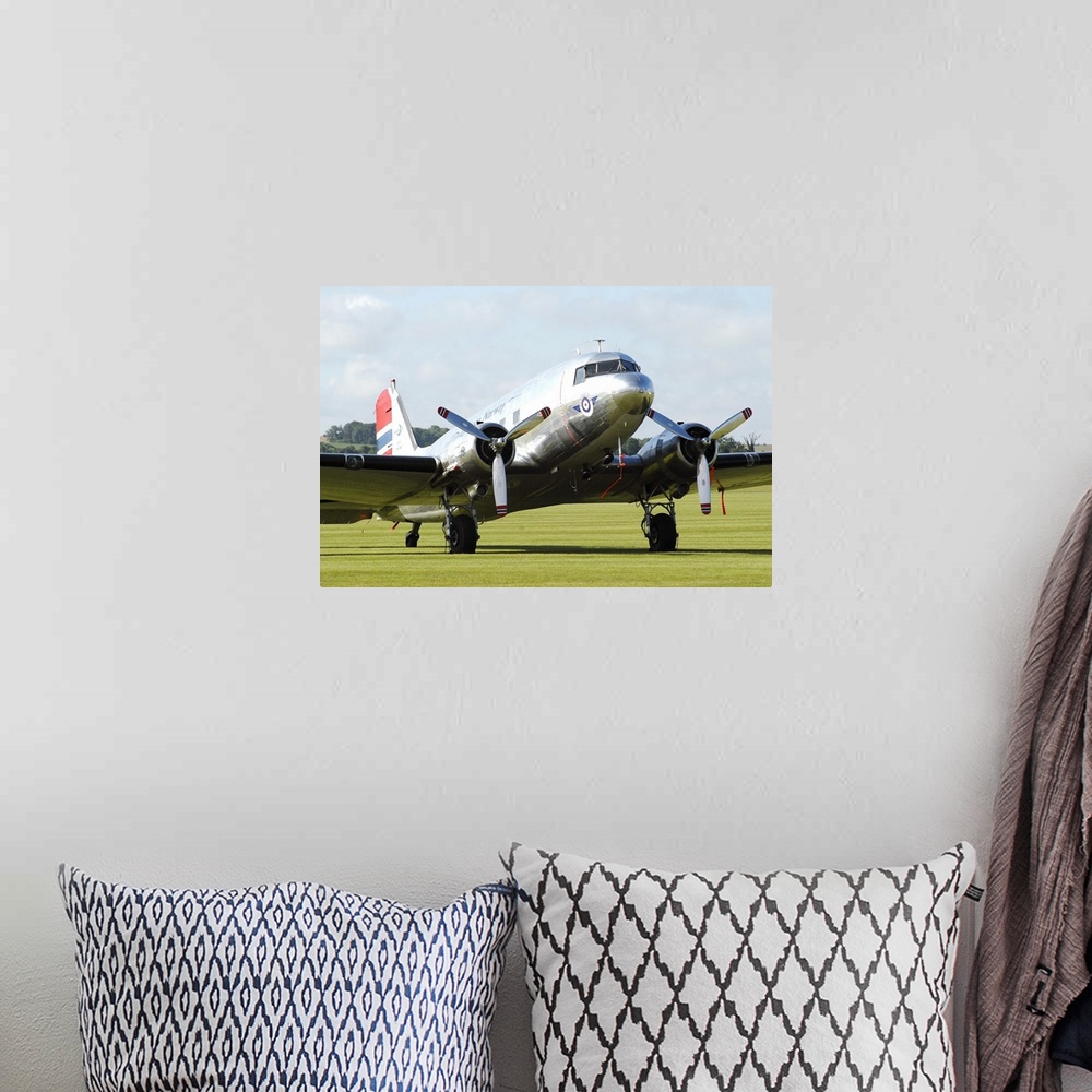 A bohemian room featuring Douglas C-47 Dakota in Norwegian colours taken on the airport at Duxford, England.