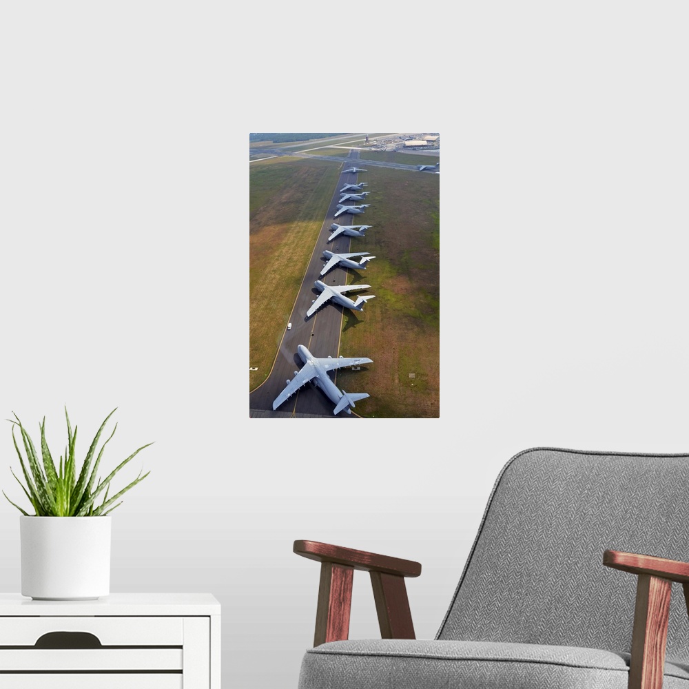 A modern room featuring August 4, 2012 - C-5 Galaxies align on the runway to make room for air show aircraft at Westover ...