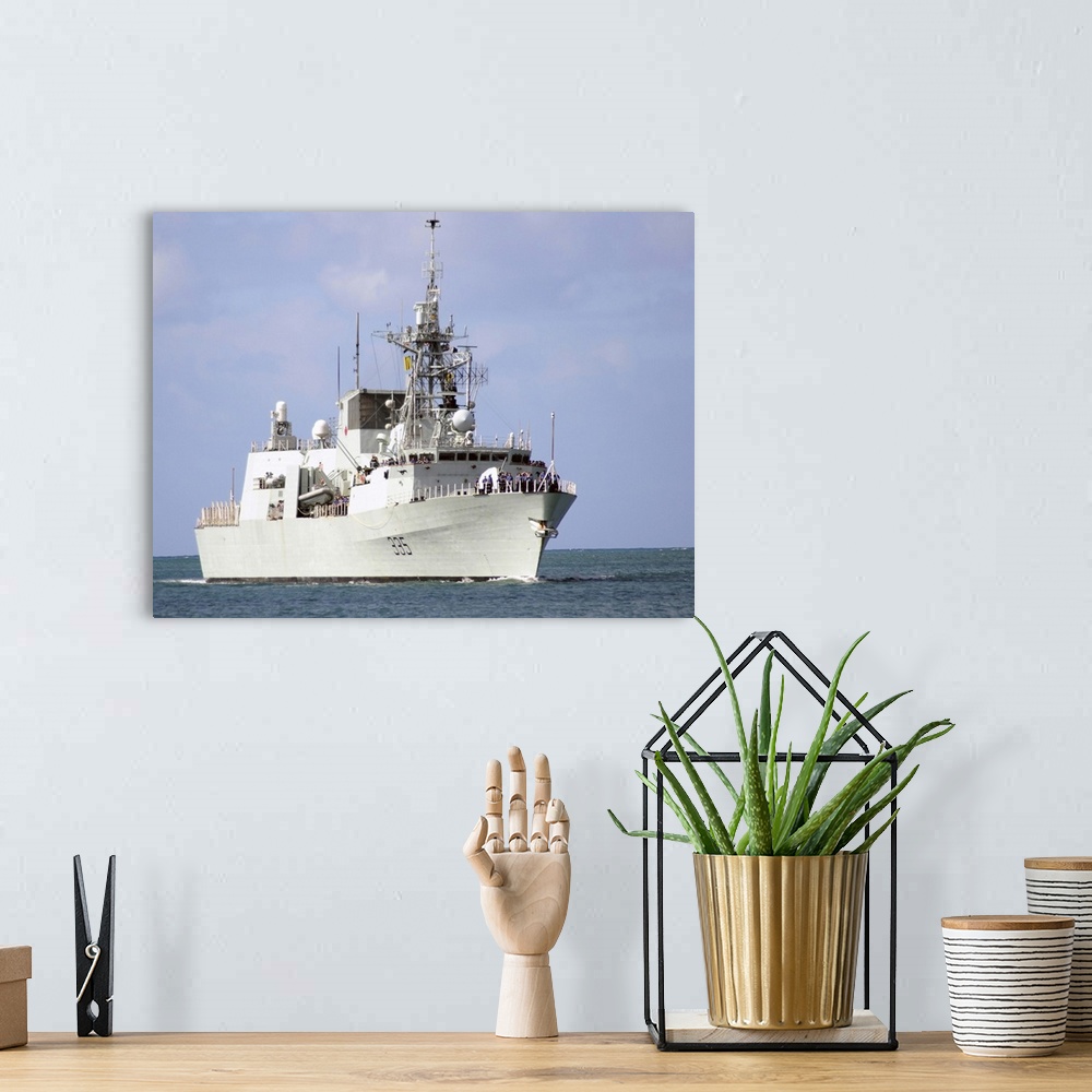 A bohemian room featuring Canadian Navy Halifax-class frigate HMCS Calgary.