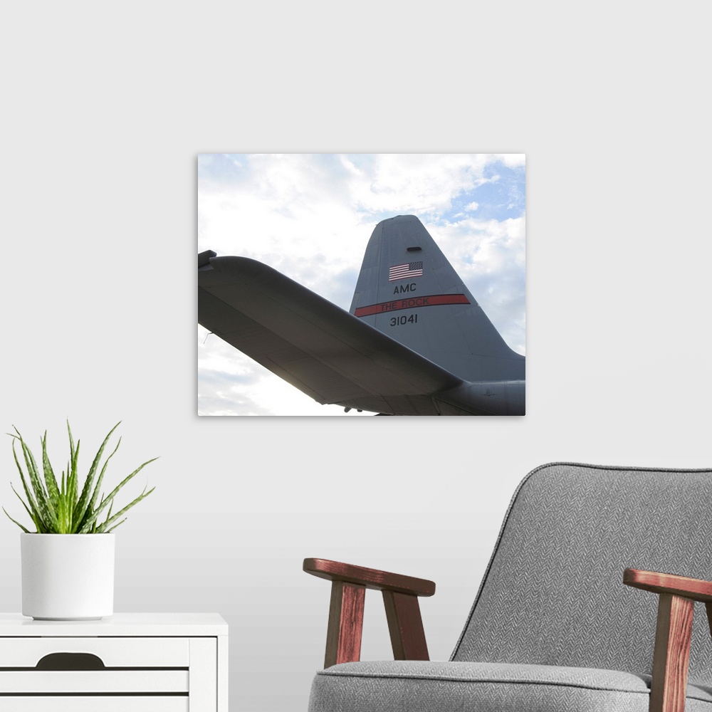 A modern room featuring Close-up of a C-130 Hercules tail assembly.