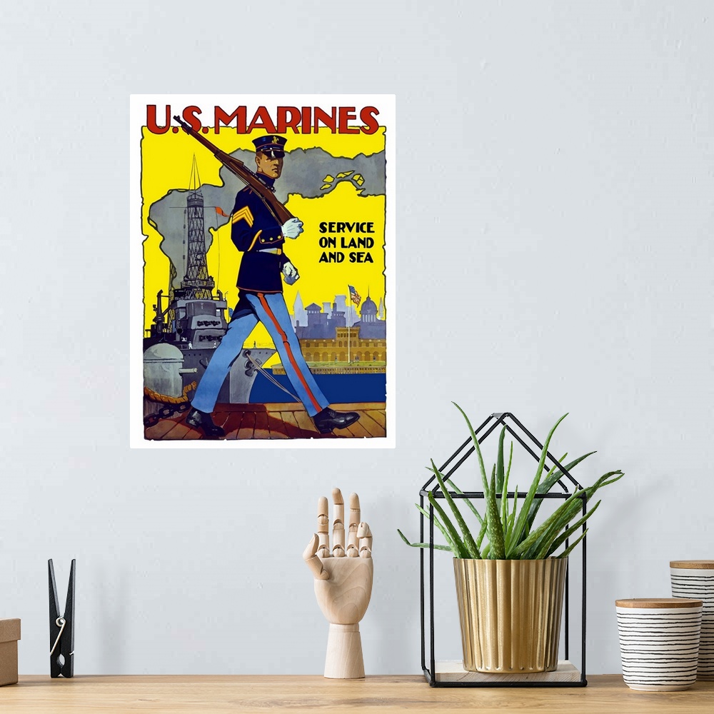 A bohemian room featuring Large, vertical, vintage World War II poster featuring a US Marine marching along a dock with his...