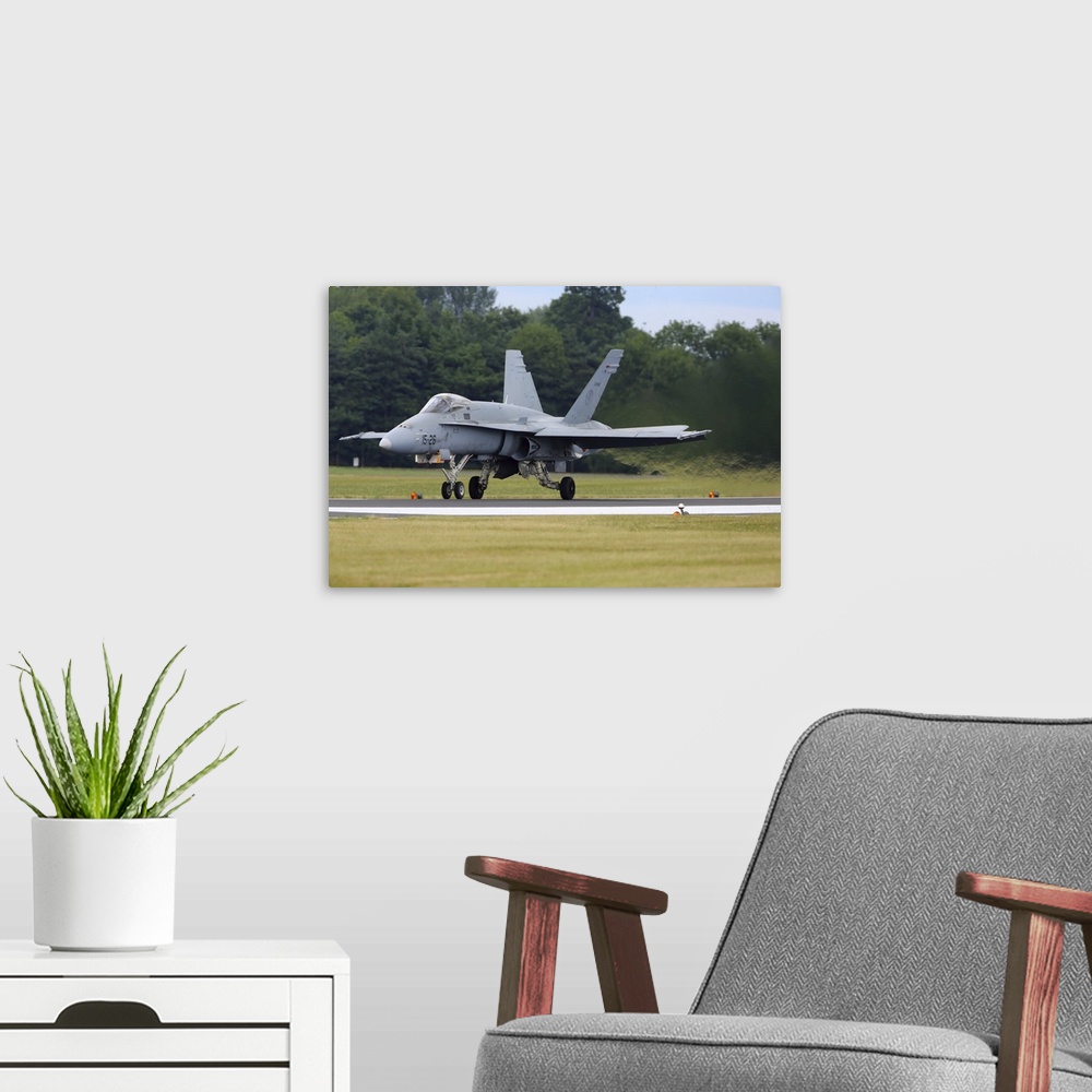 A modern room featuring EF-18 Hornet of the Spanish Air Force taxiing during RIAT-2017 airshow, Fairford, England, United...
