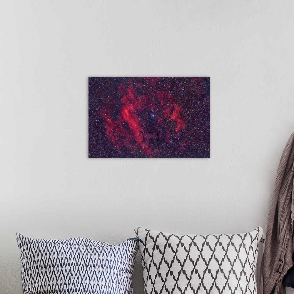 A bohemian room featuring Emission nebula Sh2-199.