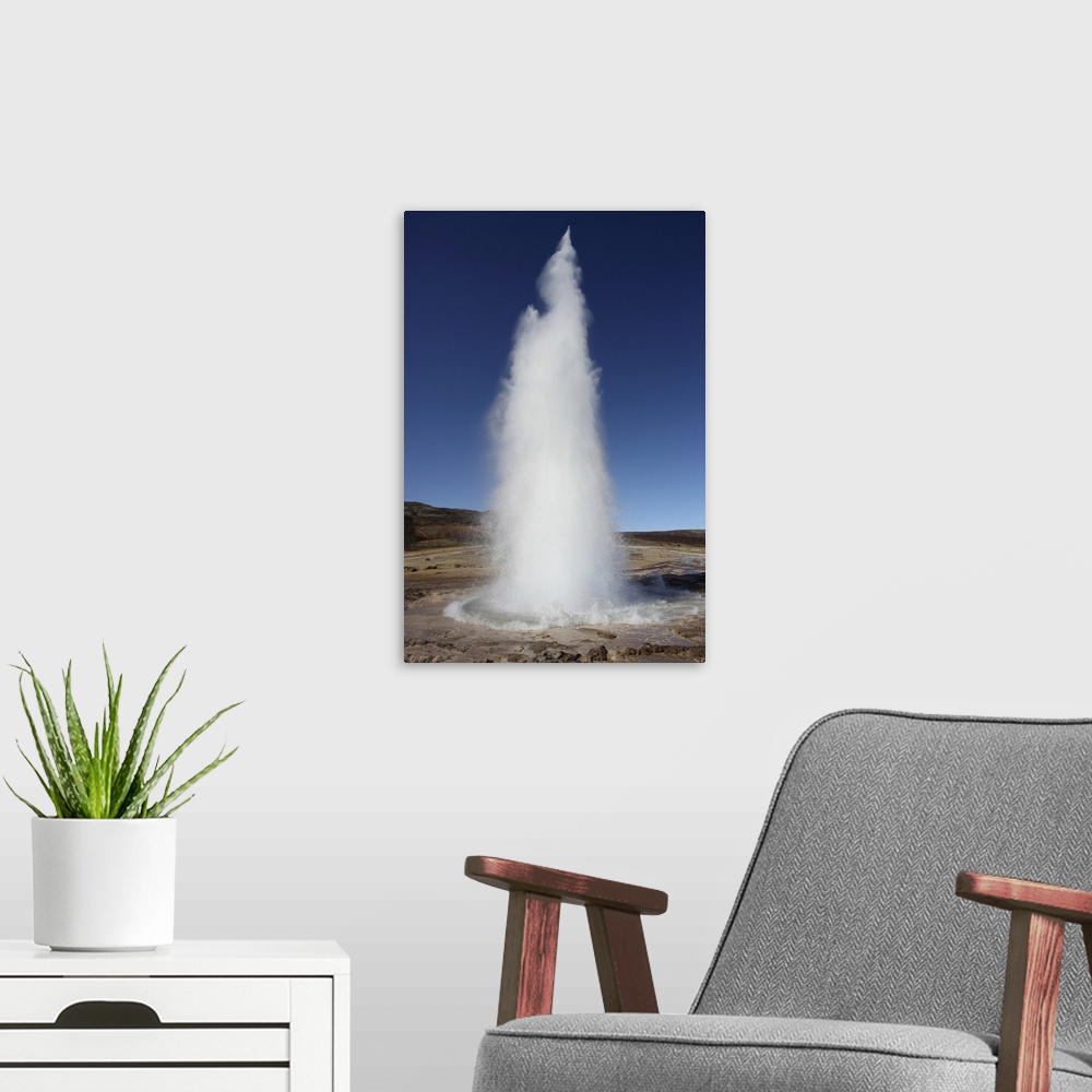 A modern room featuring May 9, 2010 - Eruption of Strokkur Geysir, Iceland. One of several geysers in Haukadalur valley.K...