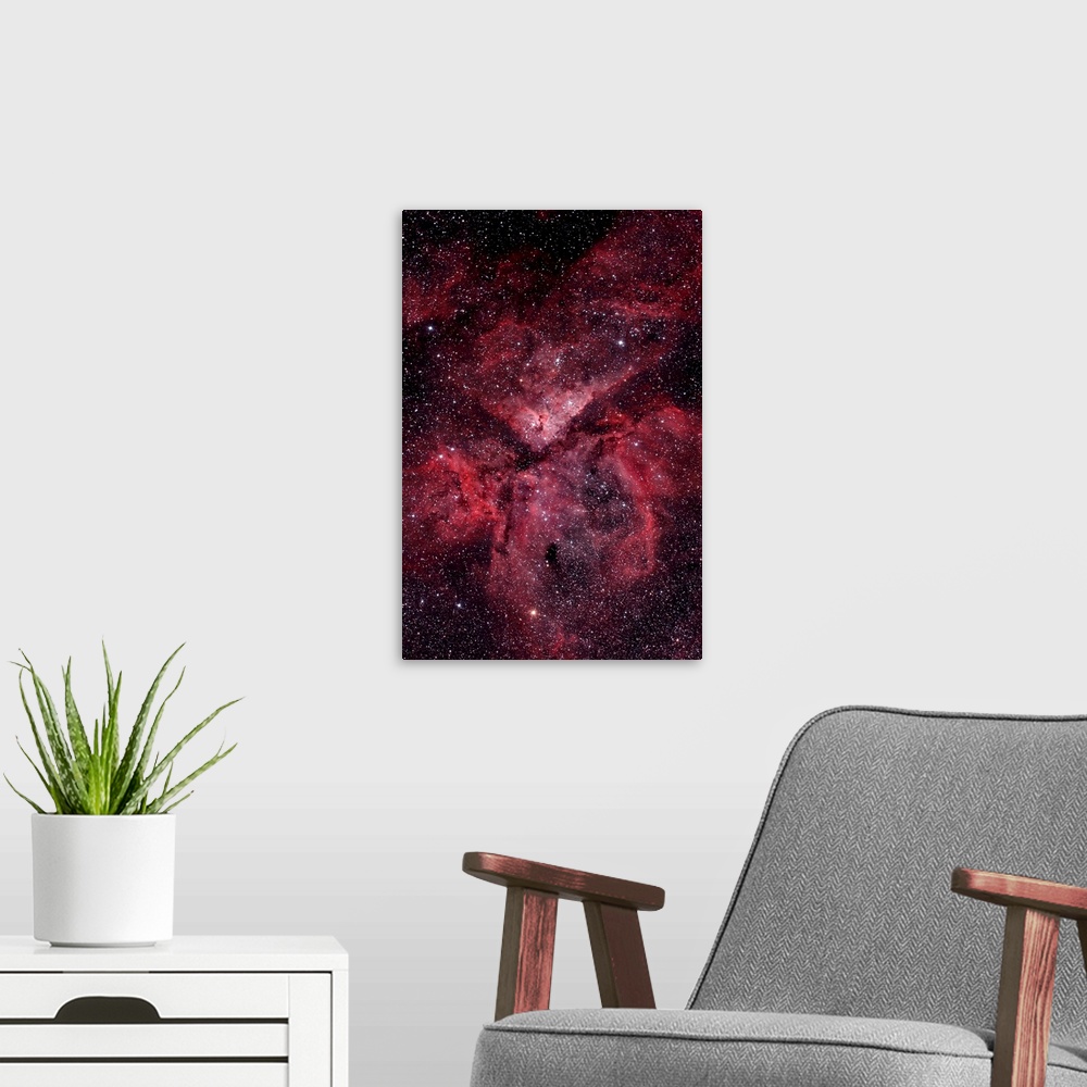 A modern room featuring Eta Carinae Nebula.