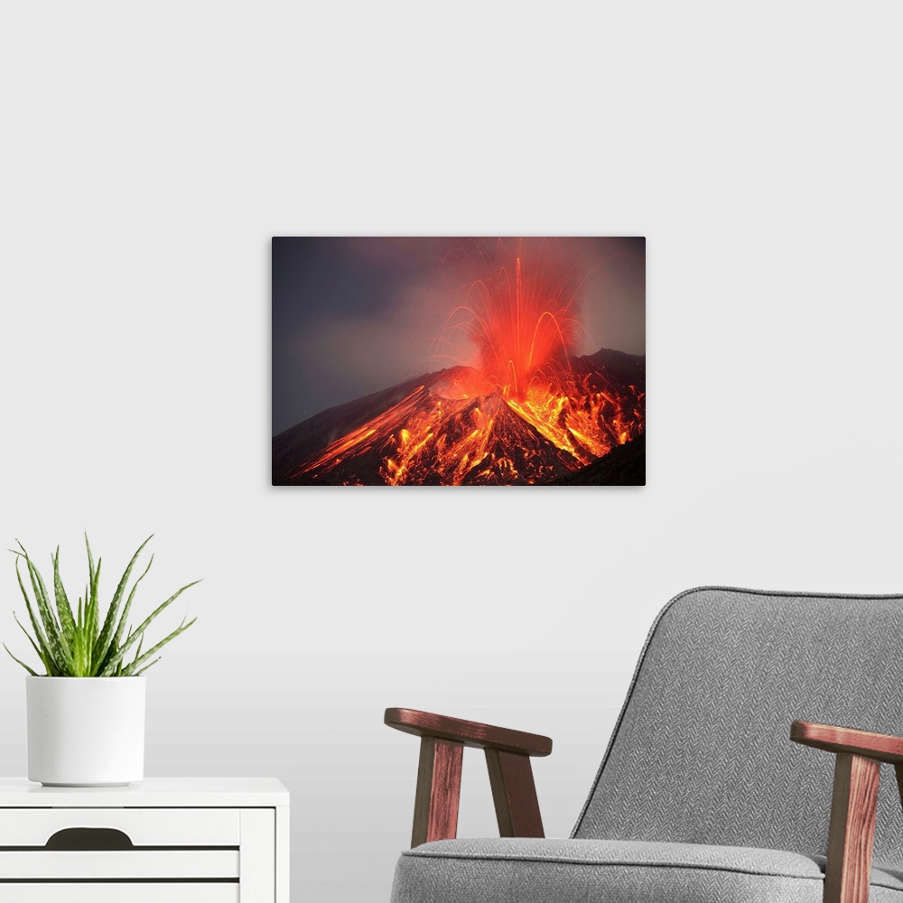 A modern room featuring January 1, 2010 - Explosive Vulcanian eruption of lava on Sakurajima Volcano, Japan.