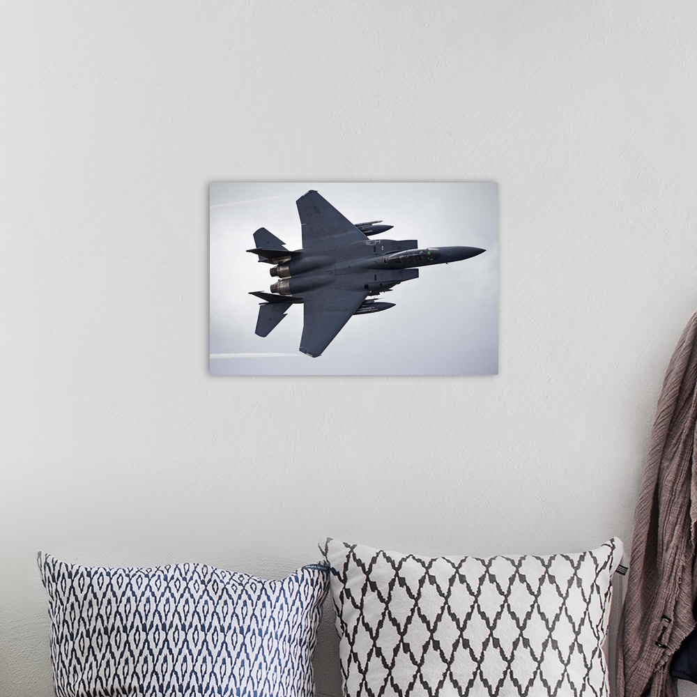 A bohemian room featuring F-15E Strike Eagle low flying over North Wales, United Kingdom.
