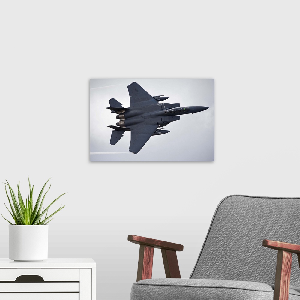 A modern room featuring F-15E Strike Eagle low flying over North Wales, United Kingdom.