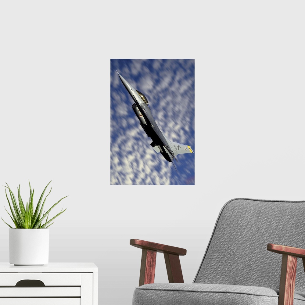 A modern room featuring F-16 Fighting Falcon flying over Fallon, Nevada.