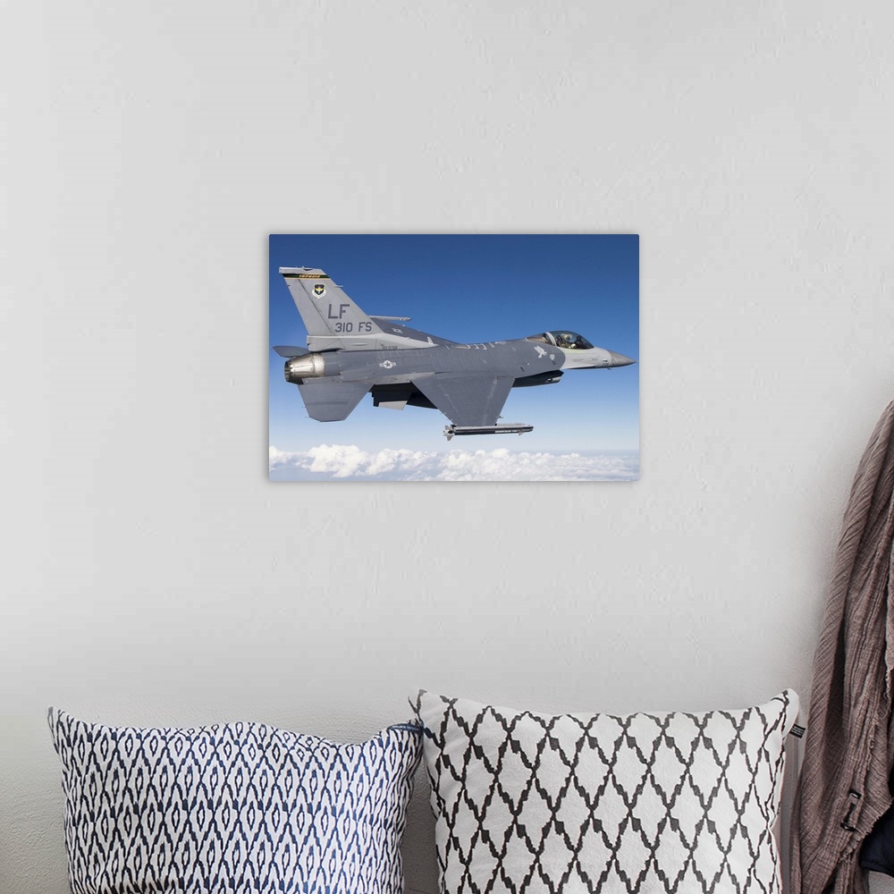 A bohemian room featuring An F-16C Fighting Falcon during a sortie over Arizona. The F-16C Fighting Falcon is the flagship ...