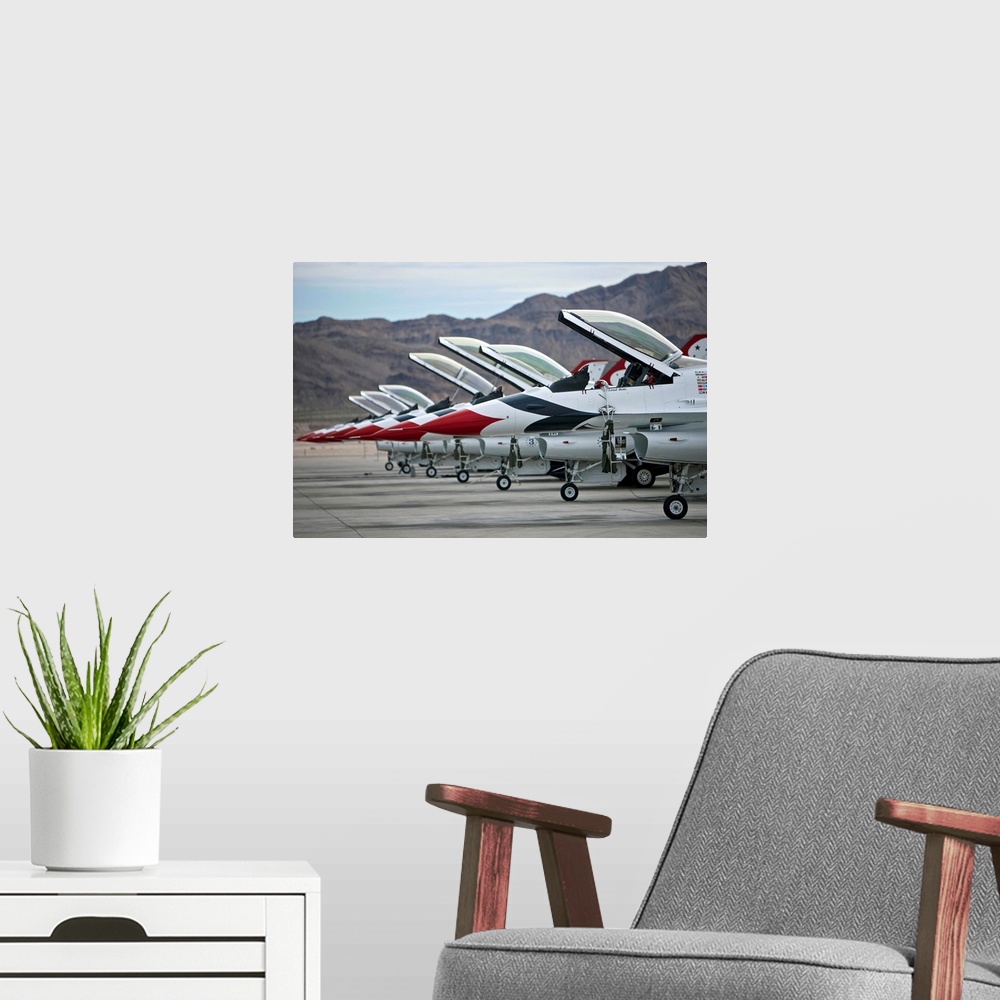A modern room featuring F-16C Thunderbirds on the ramp at Nellis Air Force Base, Nevada.