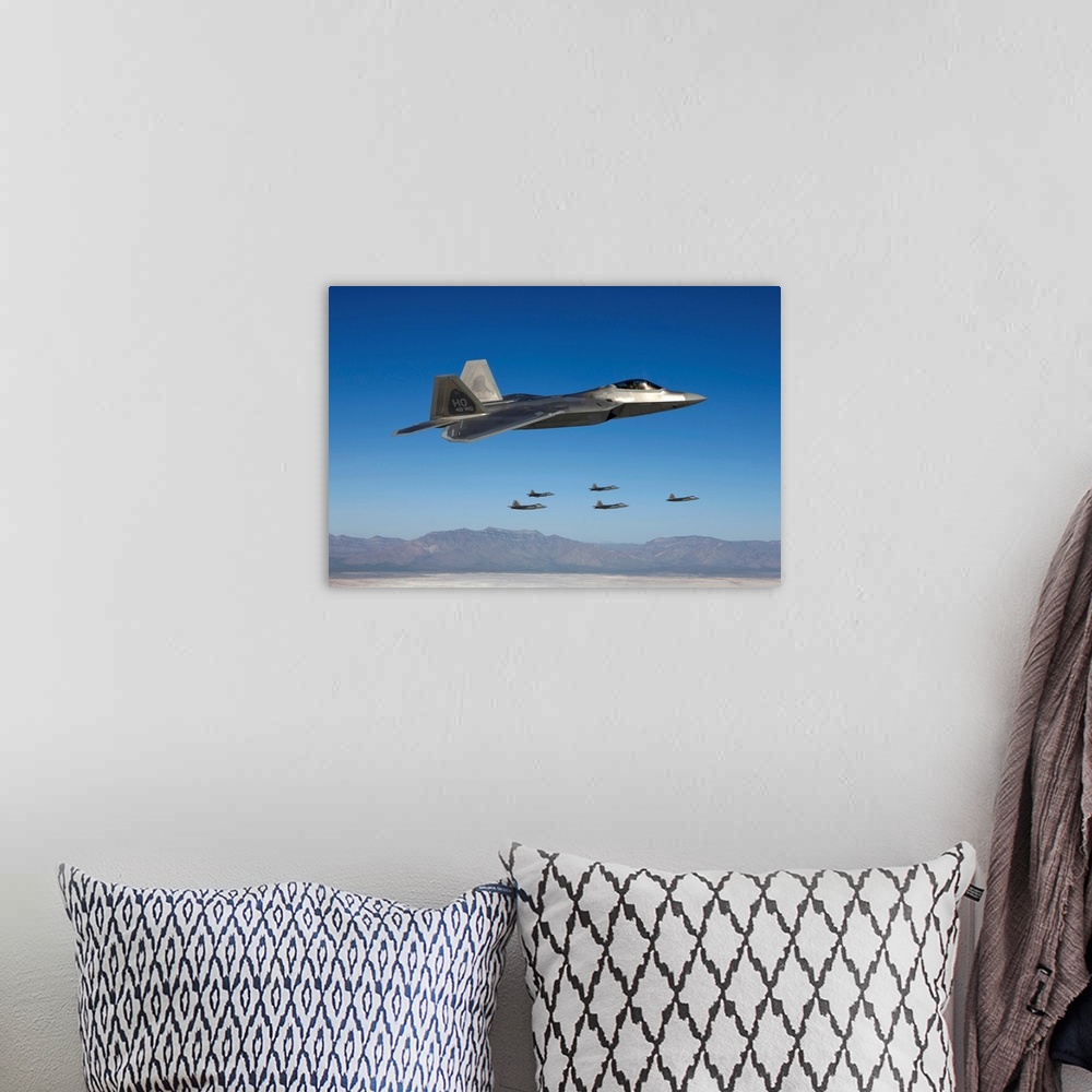 A bohemian room featuring Six F-22 Raptors fly in formation during a training mission from Holloman Air Force Base, New Mex...