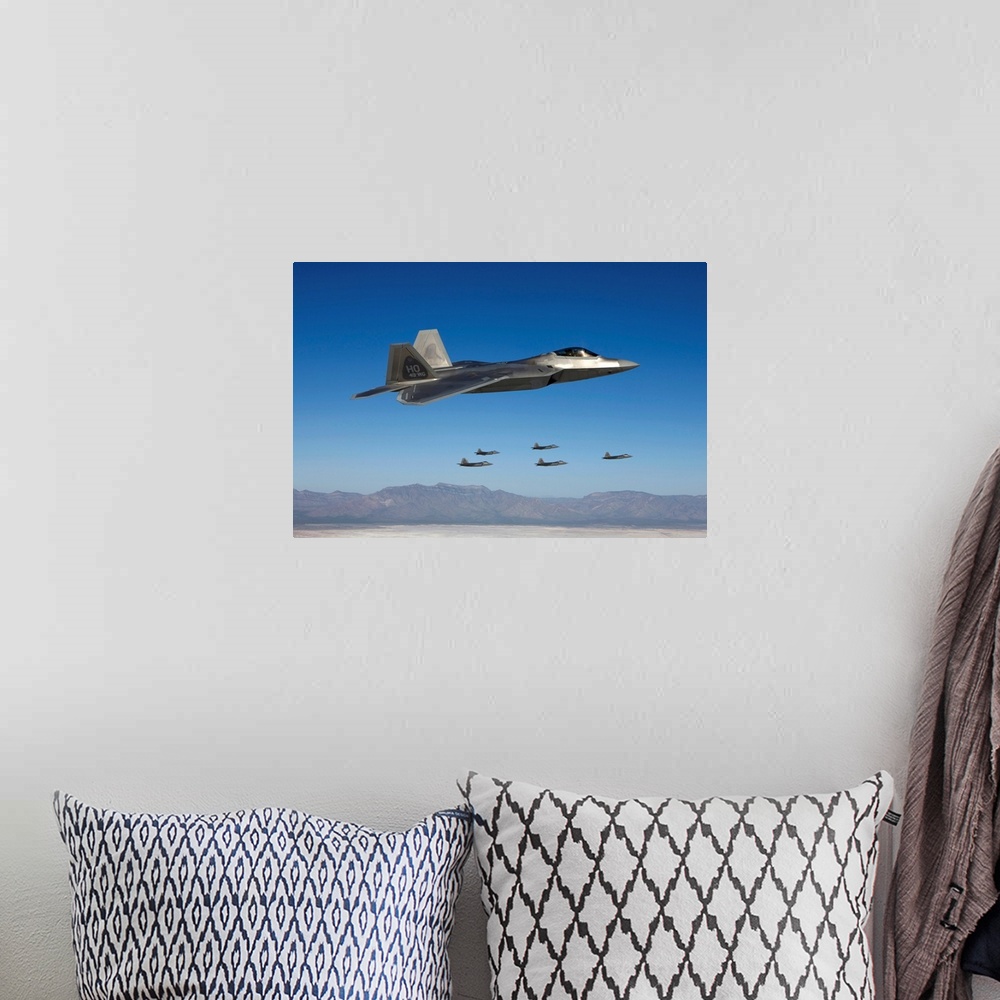 A bohemian room featuring Six F-22 Raptors fly in formation during a training mission from Holloman Air Force Base, New Mex...