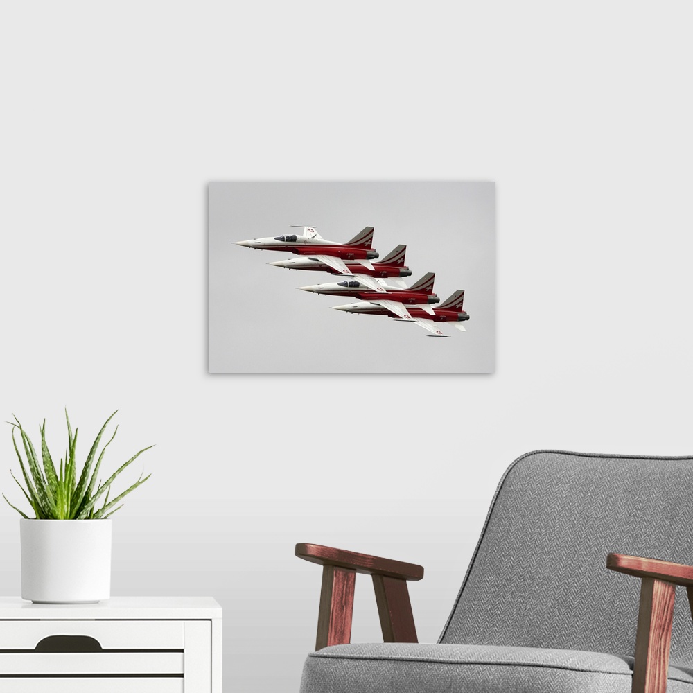 A modern room featuring F-5E Tiger II jet fighters of Patrouille Suisse during RIAT-2017 airshow, Fairford, England, Unit...