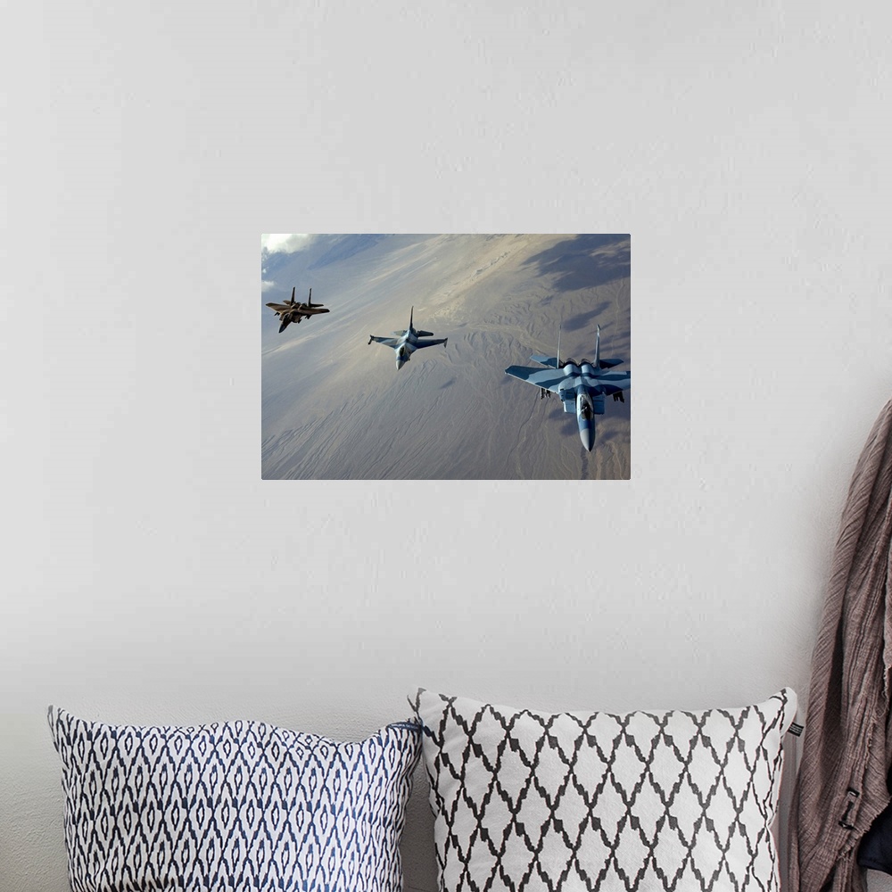 A bohemian room featuring Big photo on canvas of three fighter jets flying in a diagonal line formation above a desert.