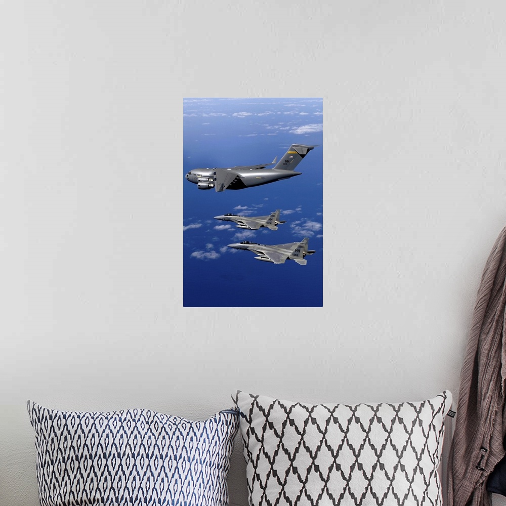 A bohemian room featuring F15B Eagles escort the first Hawaiibased C17 Globemaster III to its home