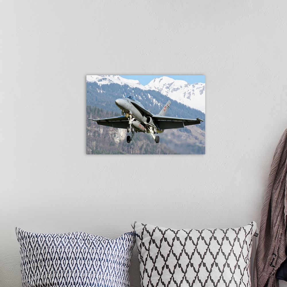 A bohemian room featuring F/A-18 from the Swiss Air Force landing.