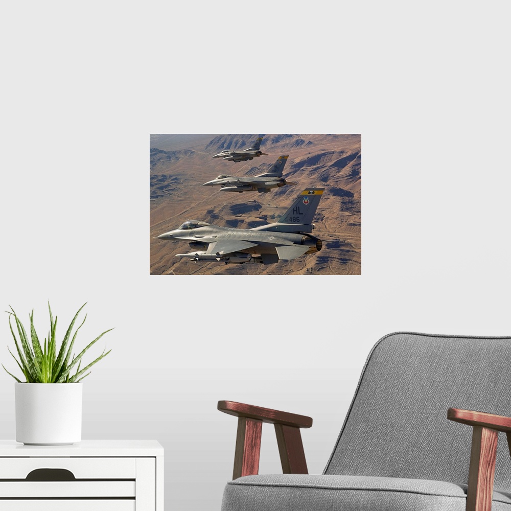A modern room featuring January 25, 2012 - Fighter jets return from the Nevada Test and Training Range on day three of Re...