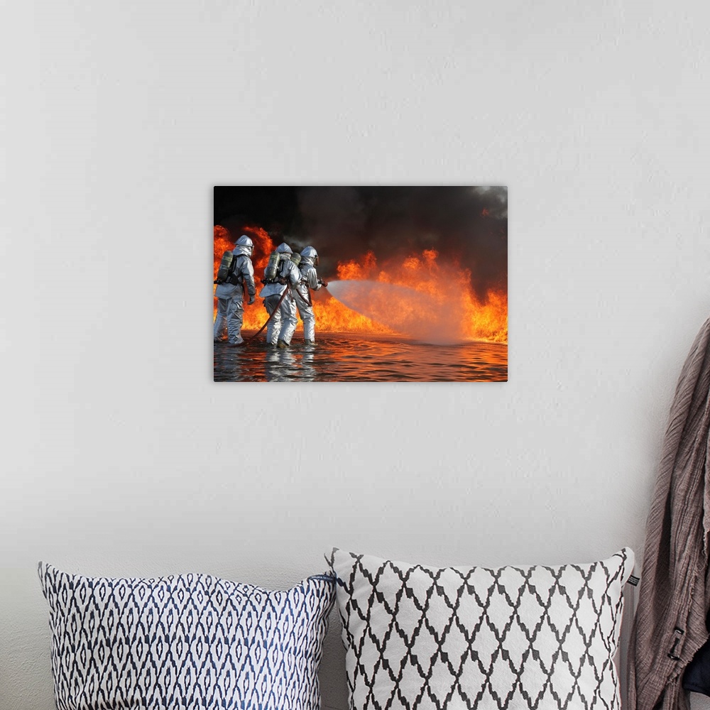A bohemian room featuring Firefighting Marines battle a huge blaze.