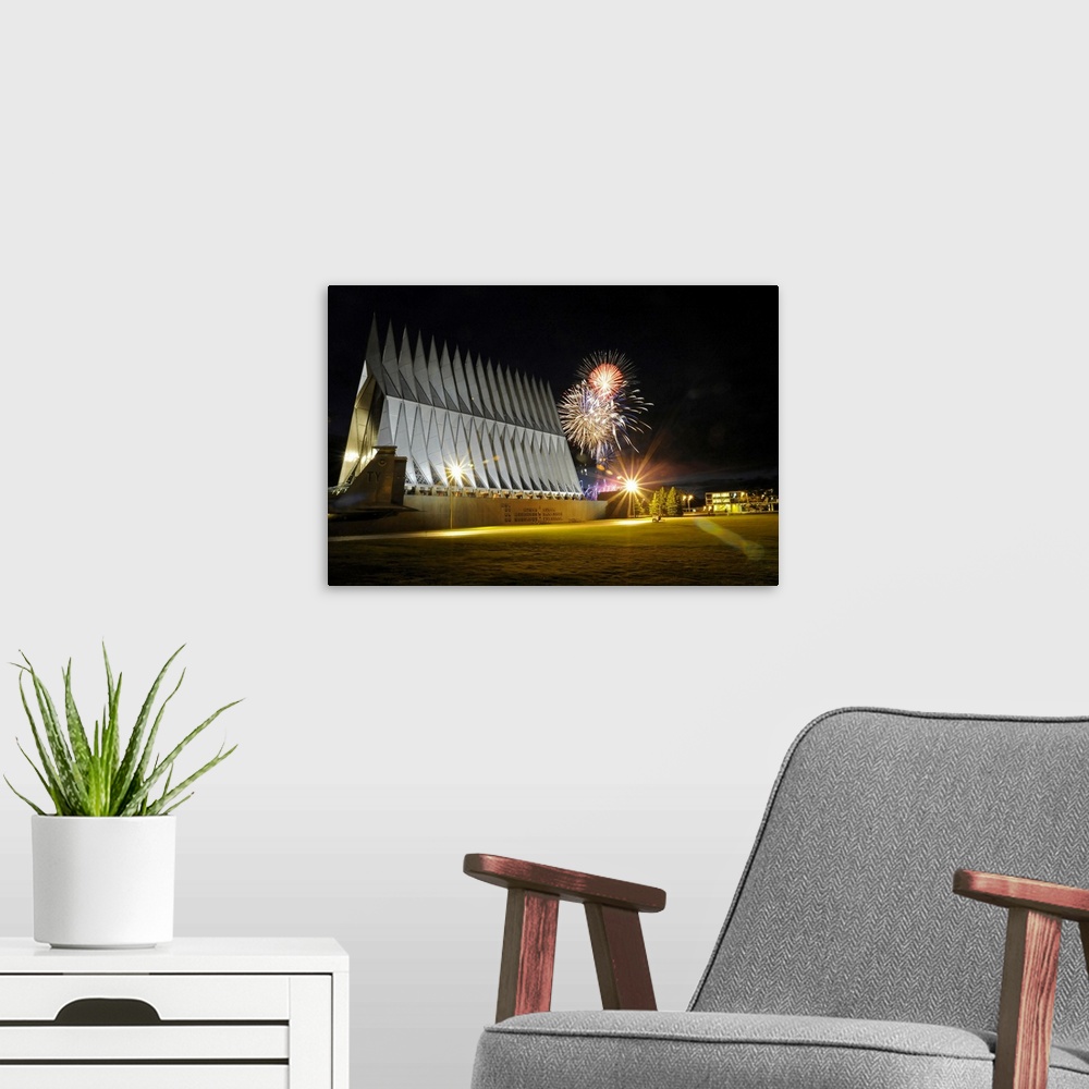 A modern room featuring Fireworks explode over the Air Force Academy Cadet Chapel