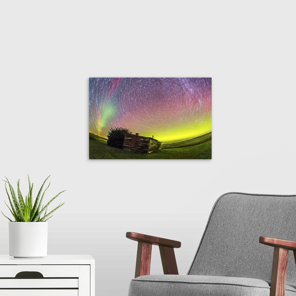 A modern room featuring August 27-28, 2014 - Fish-eye lens composite of aurora borealis and circumpolar star trails above...