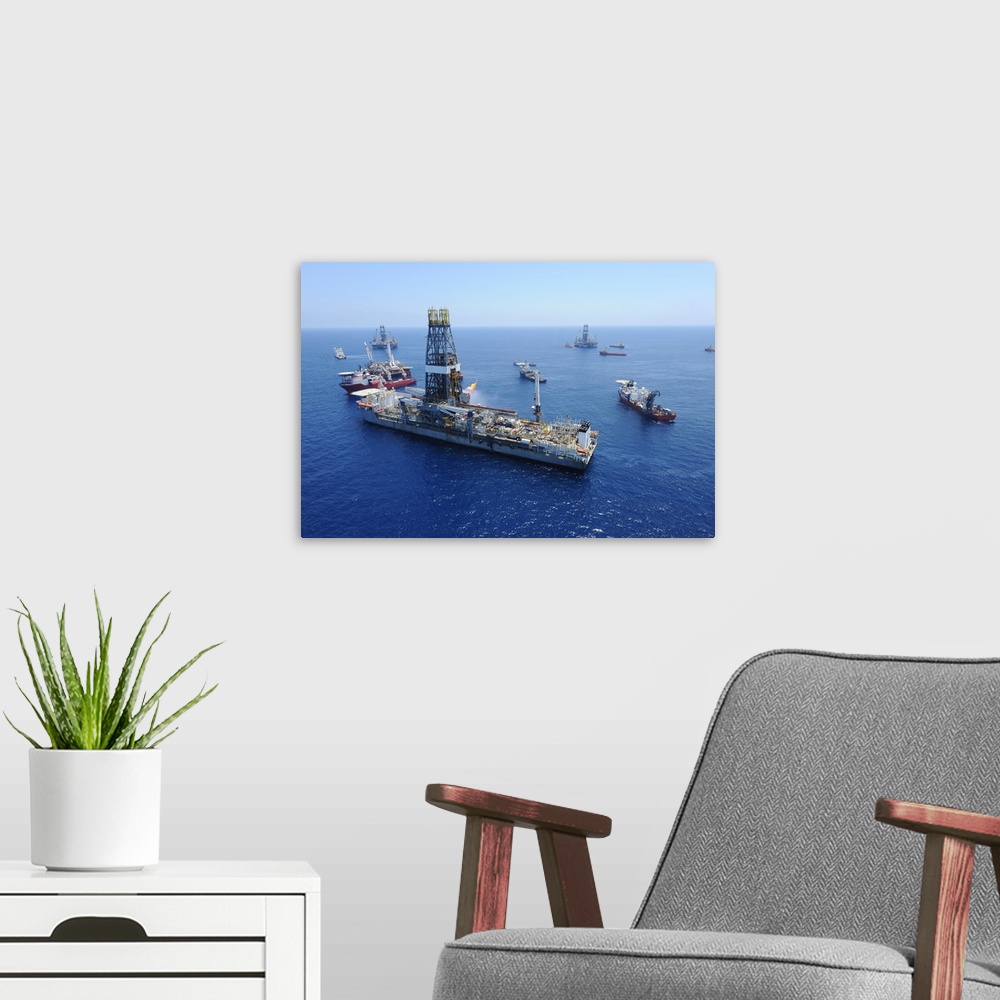 A modern room featuring Flaring operations conducted by the drillship Discoverer Enterprise.