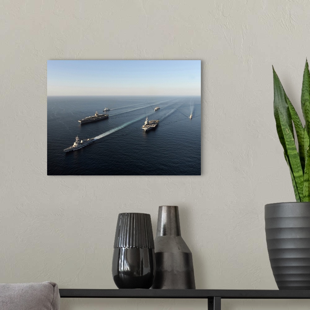 A modern room featuring Fleet of Navy ships transit the Arabian Sea.