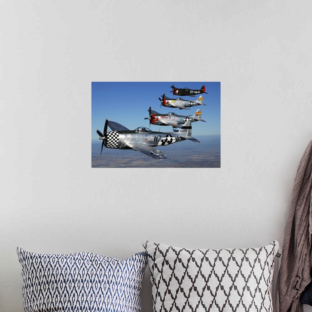 A bohemian room featuring Formation of P-47 Thunderbolts flying over Chino, California.