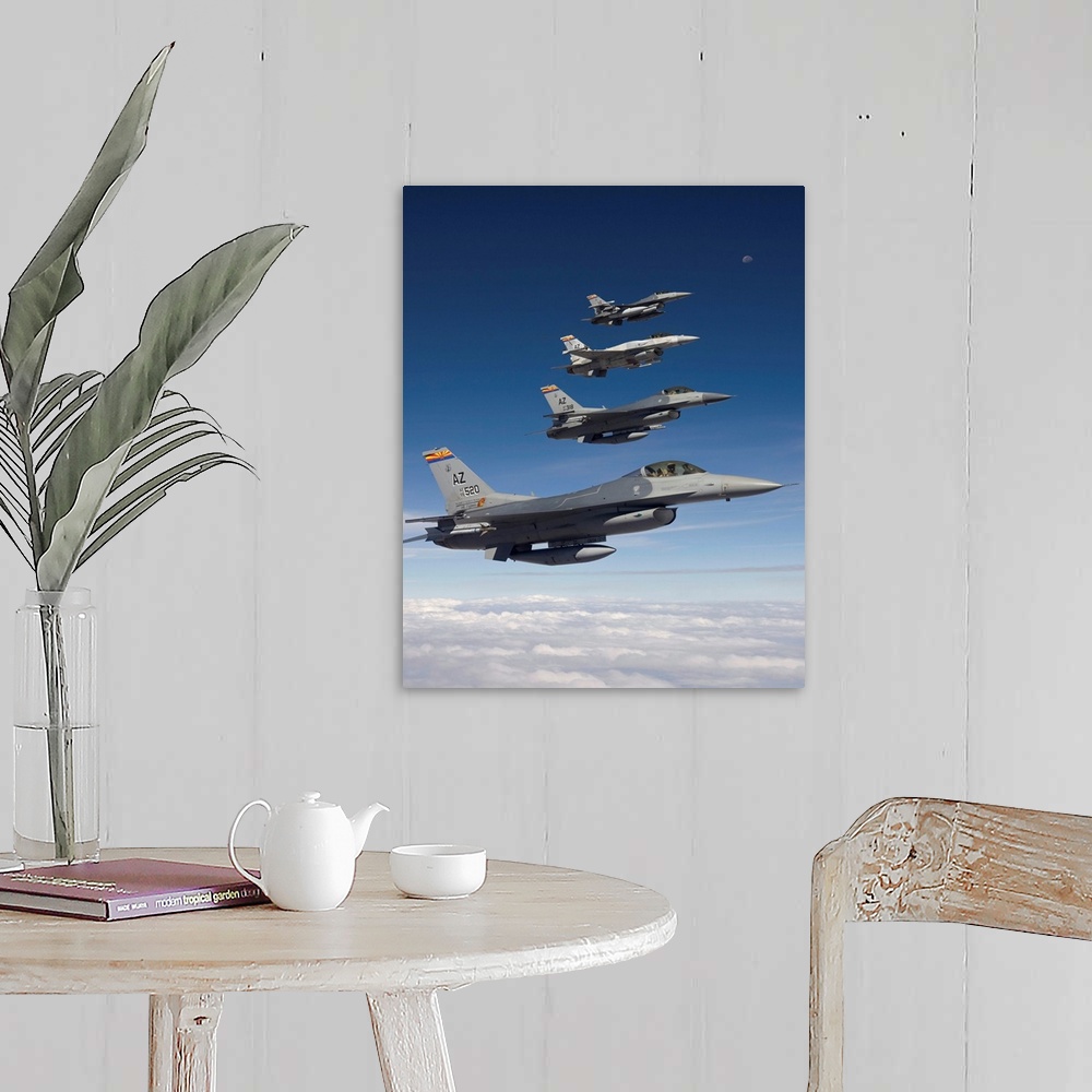 A farmhouse room featuring Four F-16's stationed at the 162nd Fighter Wing in Tucson, Arizona, fly in formation during a tra...